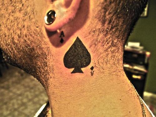 Silhouette Ace Of Spade Tattoo On Man Behind The Ear