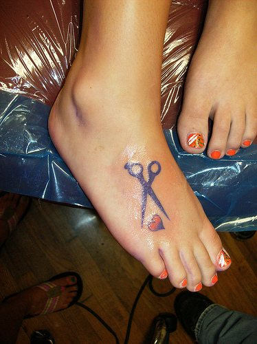 Silhouette Scissor With Red And Black Heart Tattoo On Girl Foot
