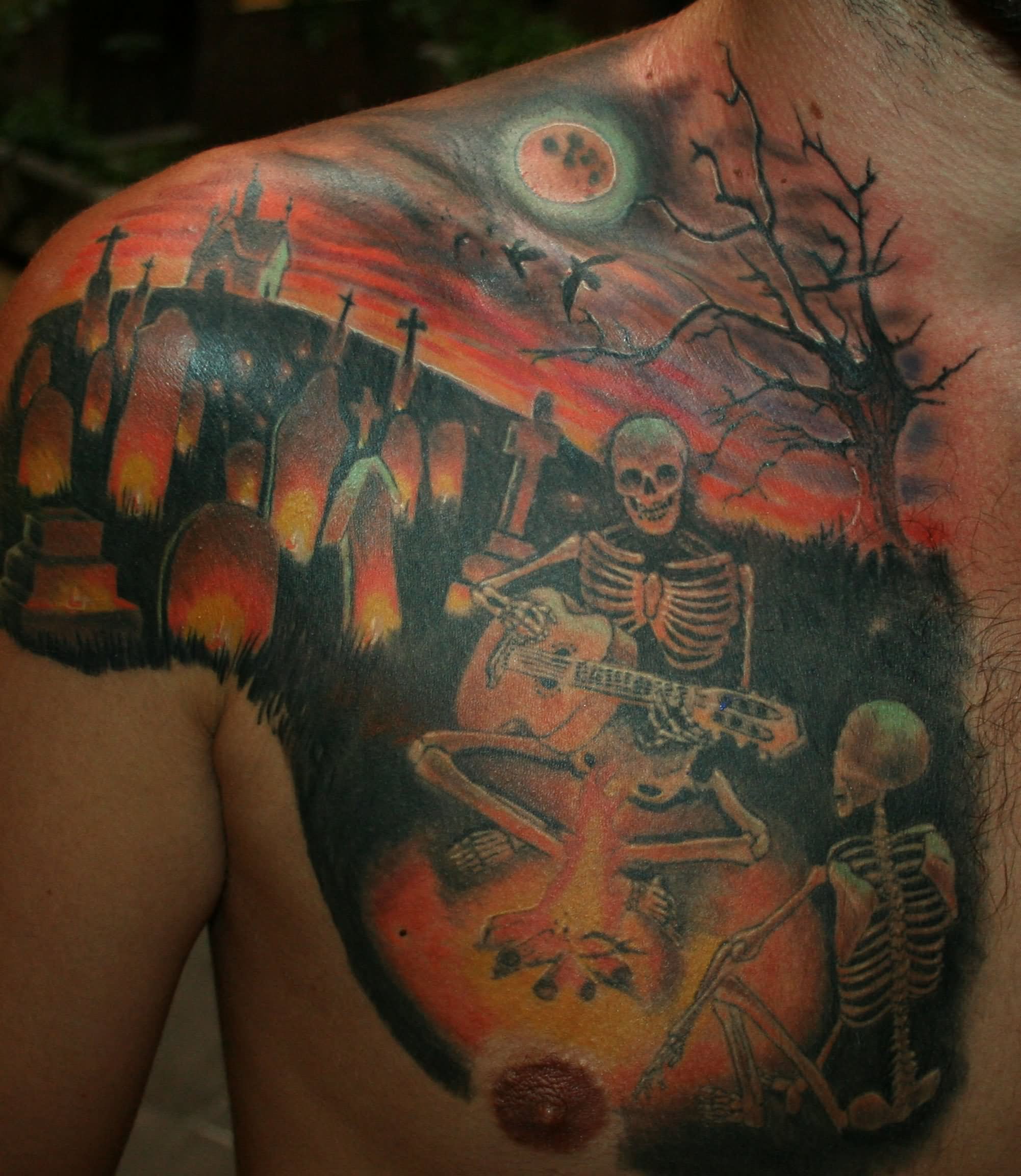 Skeletons Playing Guitar In Night Graveyard Tattoo On Chest And Shoulder