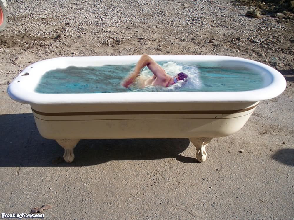 Swimming in a Bath Tub Funny Picture