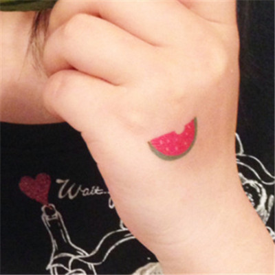 Tiny Watermelon Bite Piece Fruit Tattoo On Hand