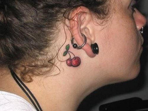 Two Red Cherry Tattoo On Girl Behind The Ear