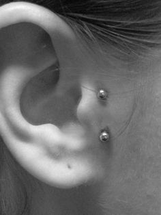 Vertical Surface Tragus Piercing Picture For Girls