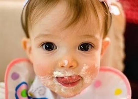 Baby Eating Funny Face Picture
