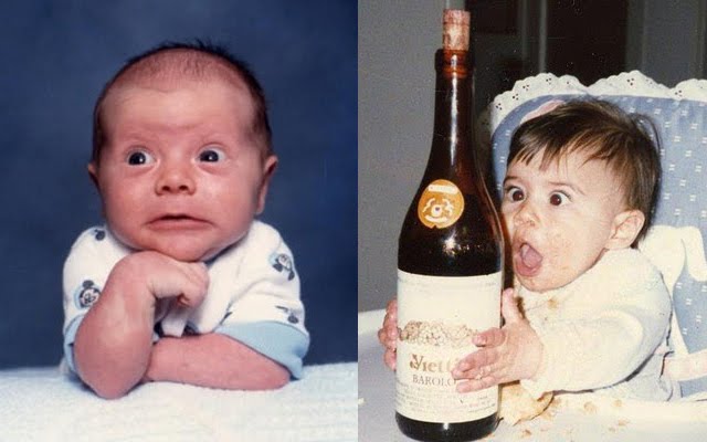 Baby With Wine Bottle Making Funny Face