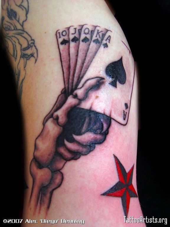 Black And Grey Poker Cards In Skeleton Hand Tattoo Design