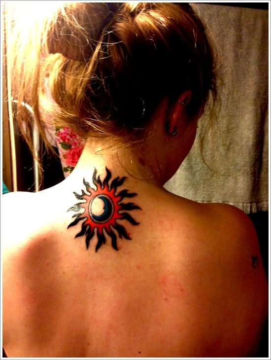 Black And Red Sun Tattoo On Girl Upper Back