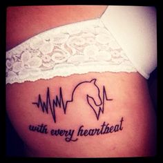 Black Heartbeat With Horse Head Tattoo On Girl Side Rib
