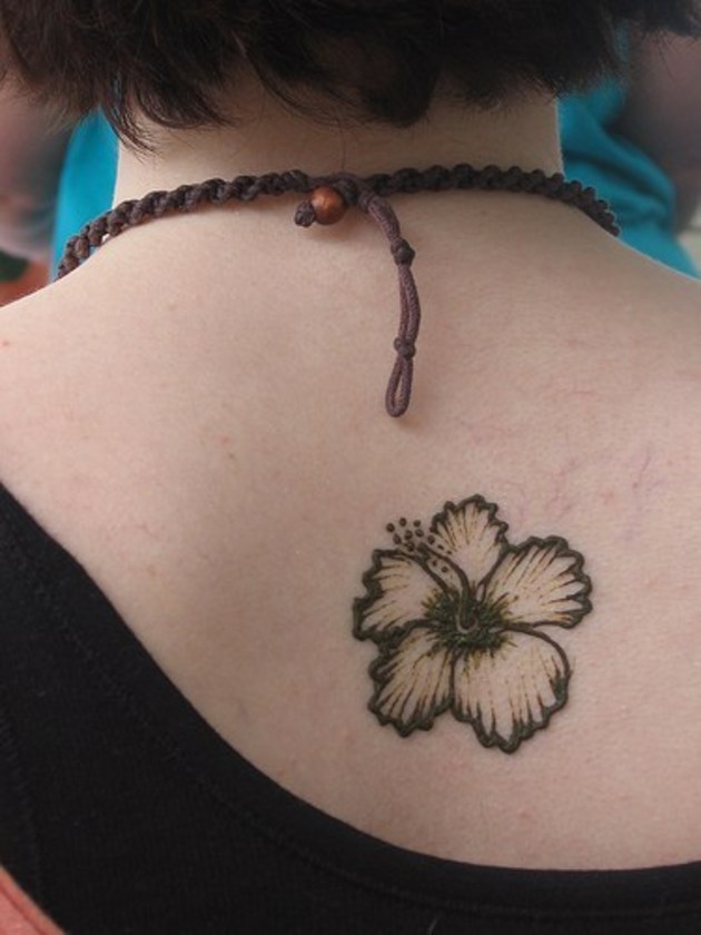 Black Hibiscus Tattoo On Upper Back
