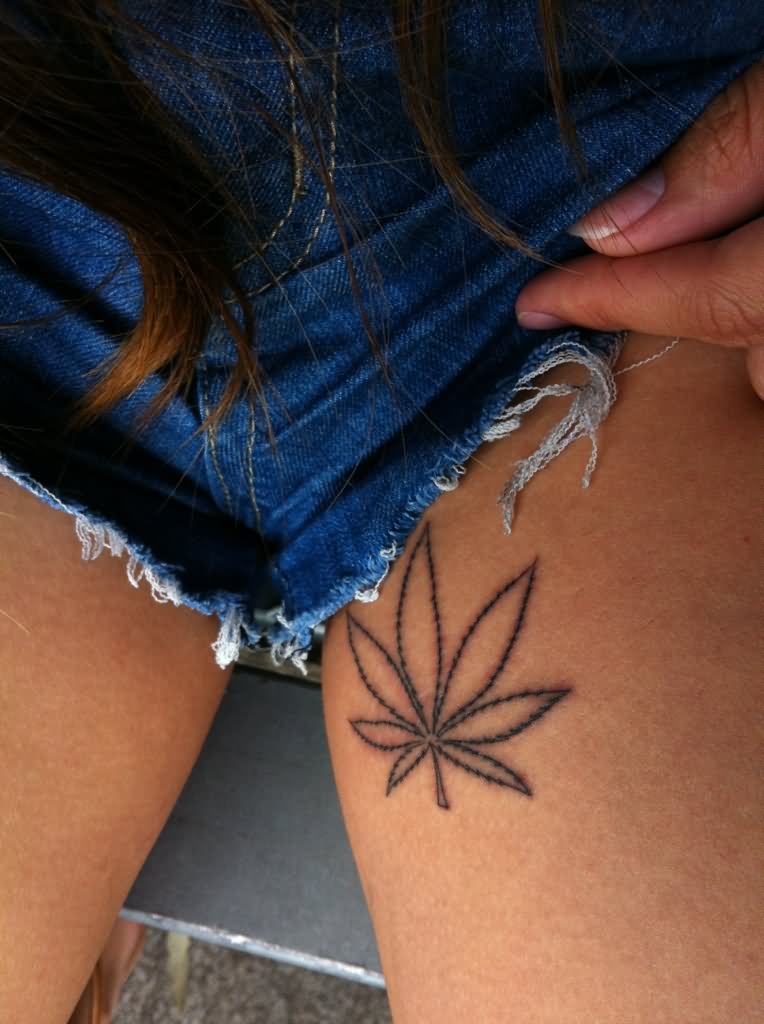 Black Outline Weed Leaf Tattoo On Girl Thigh