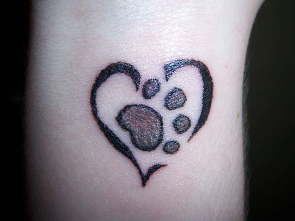 Black Paw In Heart Tattoo Design