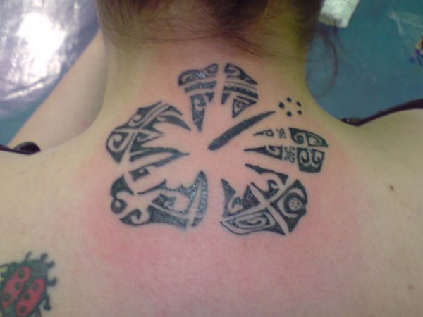 Black Polynesian Hibiscus Tattoo On Girl Back Neck