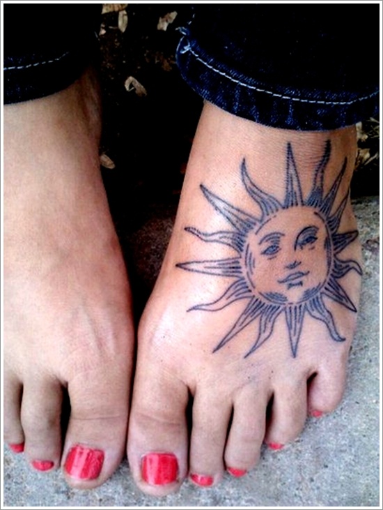 Black Sun Face Tattoo On Girl Foot