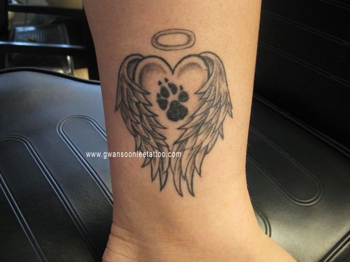 Black Wolf Paw In Heart With Wings Tattoo On Leg