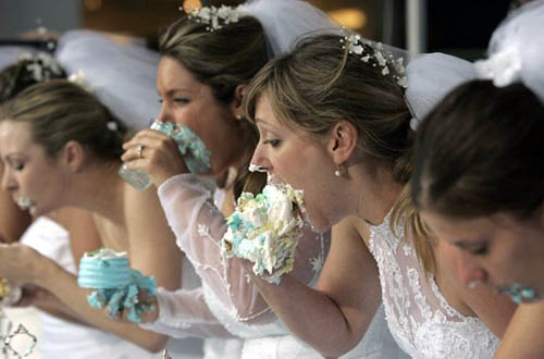 Brides Cake Eating In Contest Funny Picture