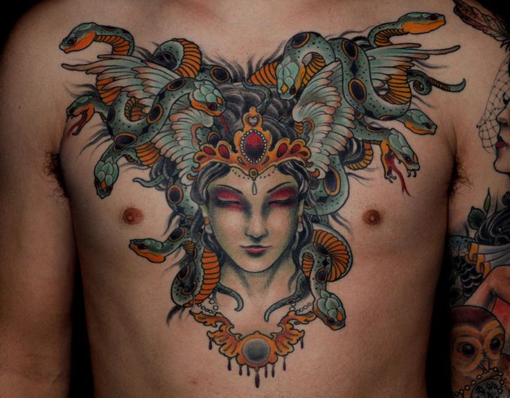 Colorful Amazing Medusa Face Tattoo On Man Chest