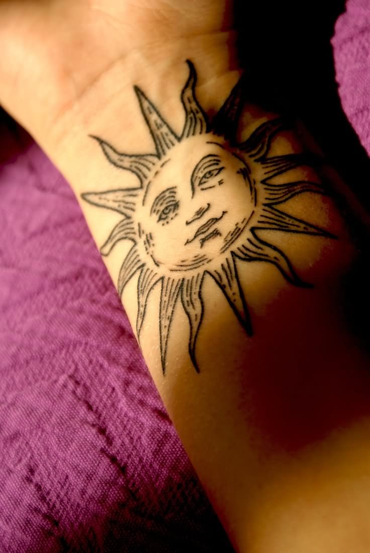 Cute Black Sun Tattoo On Wrist