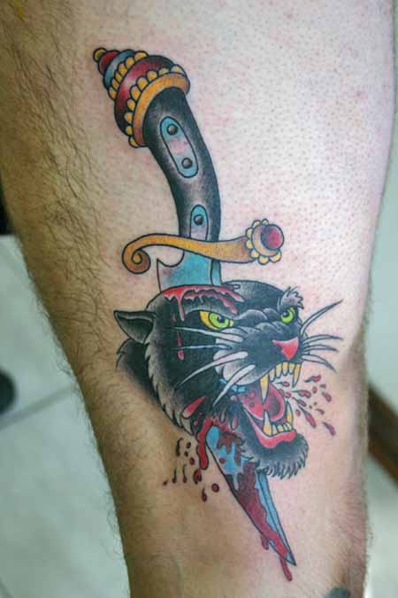 Dagger In Panther Head Tattoo On Thigh