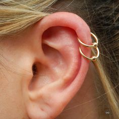 Dual Helix Piercing With Dual Gold Bead Rings