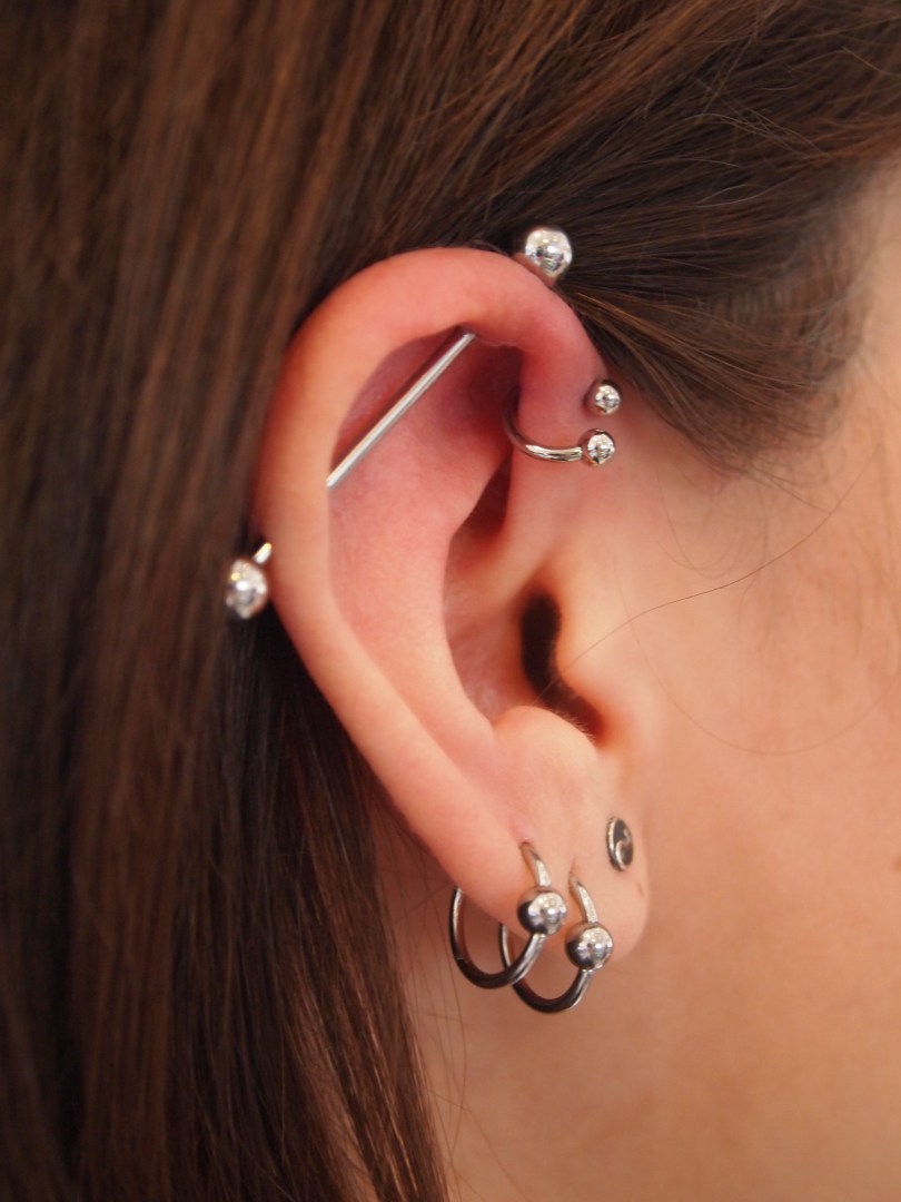 Dual Lobe And Industrial Helix Piercing