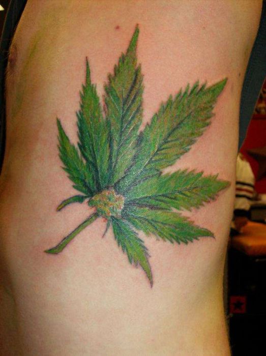 Green Weed Leaf Tattoo On Man Side Rib
