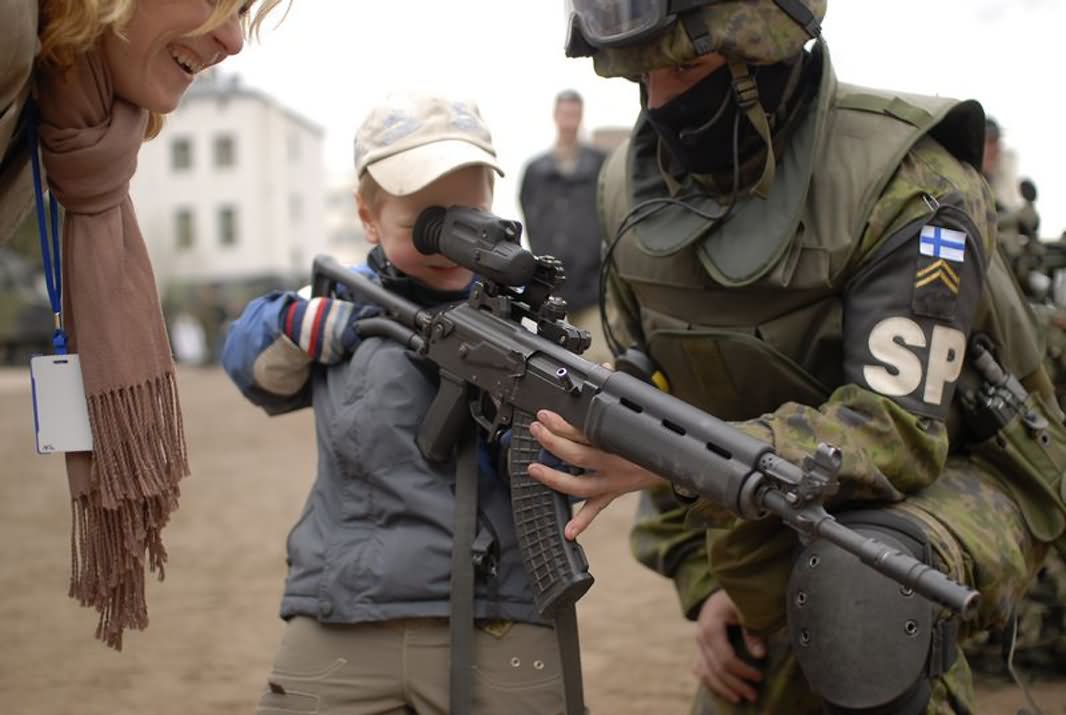 Kid With Gun Funny War Picture