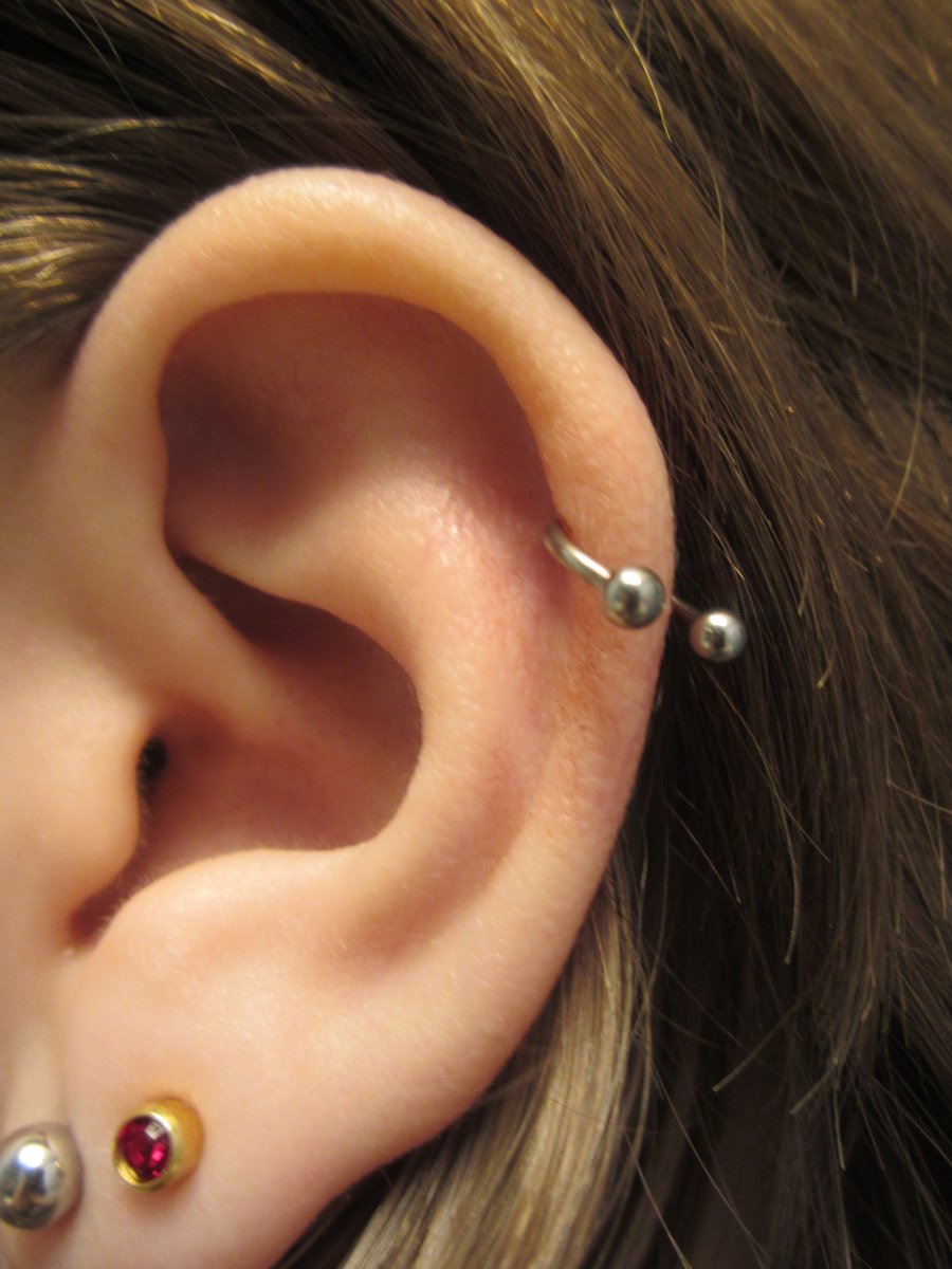 Left Ear Dual Lobe And Helix Piercing For Girls
