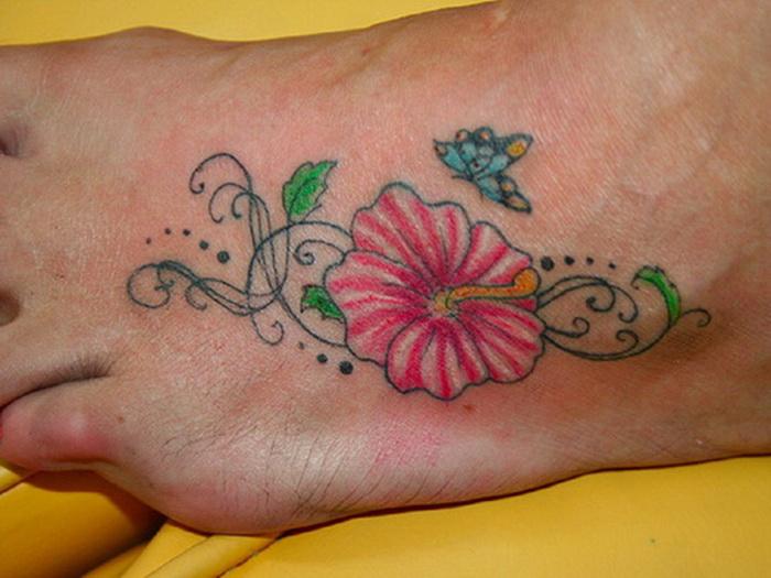 Pink Hibiscus With Leave Tattoo On Foot