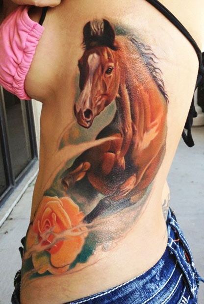 Realistic Horse With Rose Tattoo On Upper Side Rib