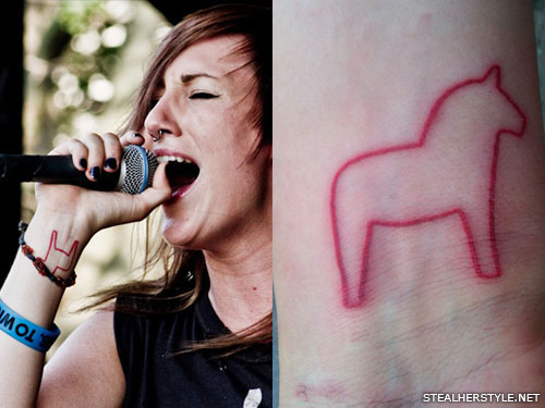 Red Outline Horse Tattoo On Girl Wrist