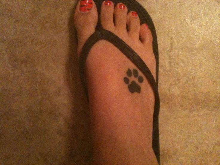 Silhouette Paw Tattoo On Girl Foot