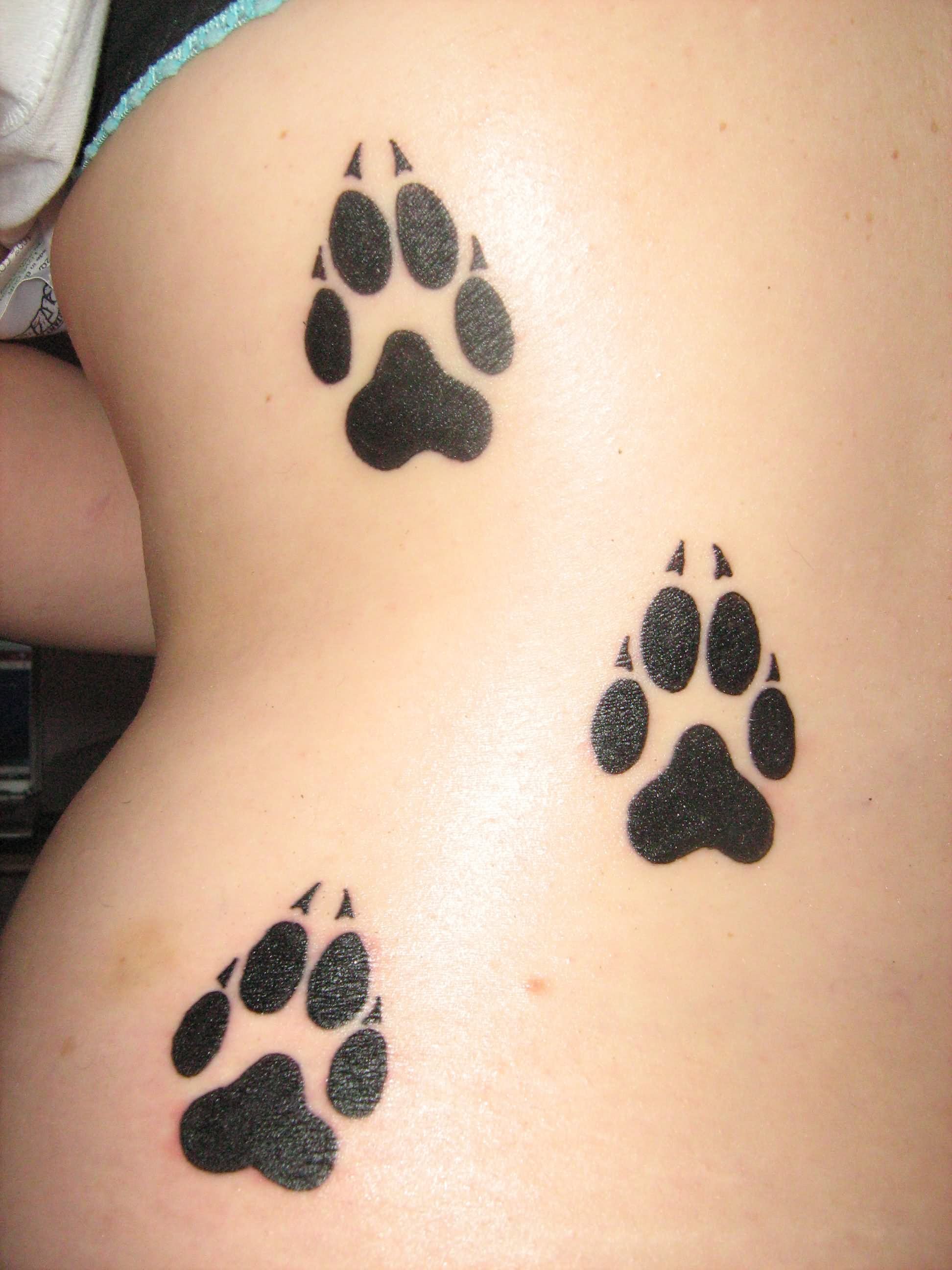 Silhouette Three Wolf Print Tattoo On Girl Side Rib