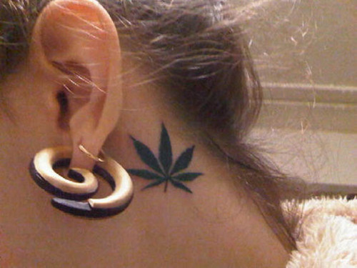 Silhouette Weed Leaf Tattoo On Girl Behind The Ear