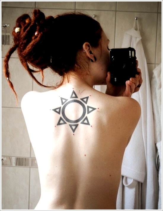 Unique Sun Tattoo On Girl Upper Back