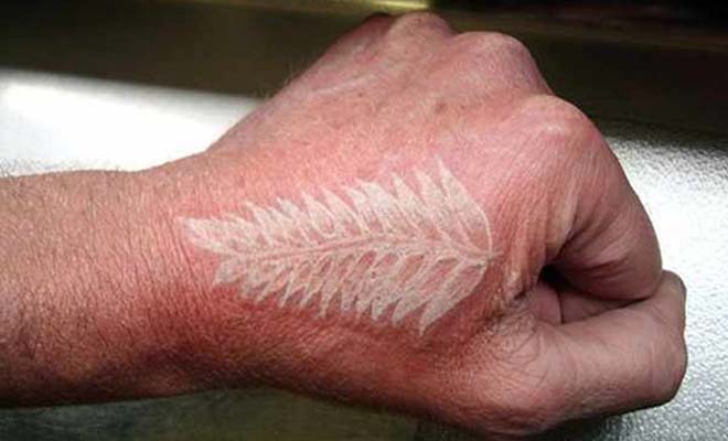 White Fern Leaf Tattoo On Hand