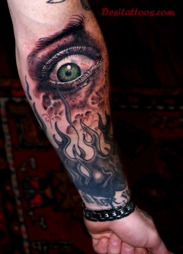 3D Scary Eye With Flame Tattoo On Forearm