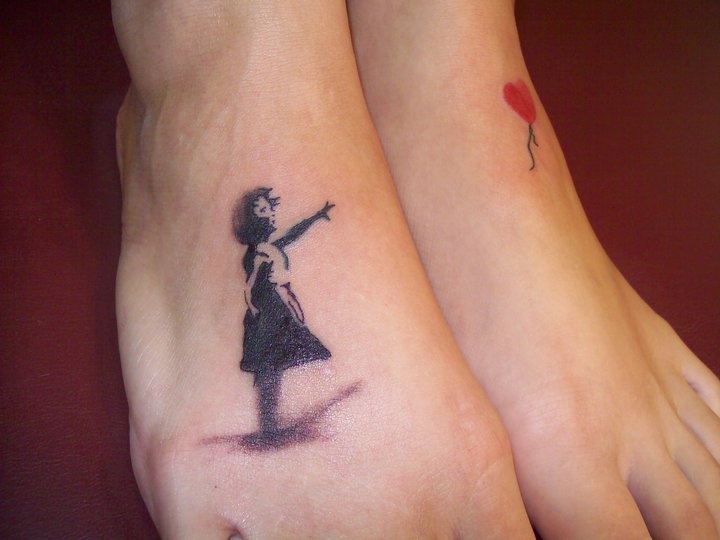 Amazing Banksy Girl Tattoo On Feet