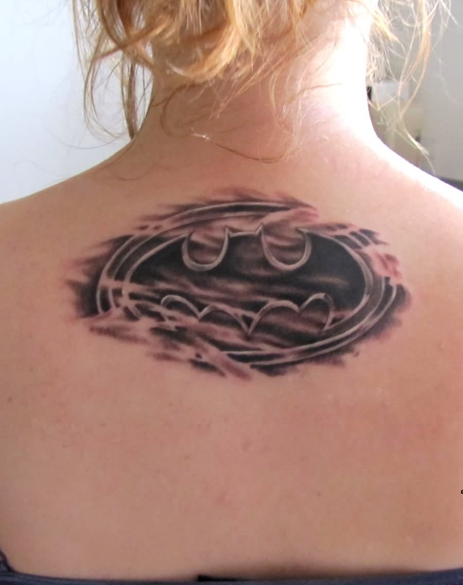 Amazing Batman Logo Tattoo On Girl Upper Back By Signe