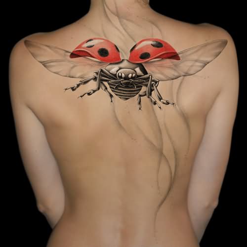 Awesome Flying Ladybird Tattoo On Girl Upper Back
