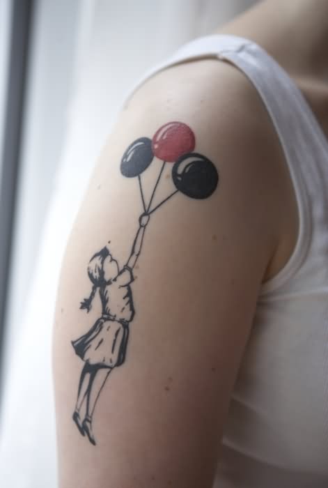 Banksy Girl Tattoo On Girl Shoulder
