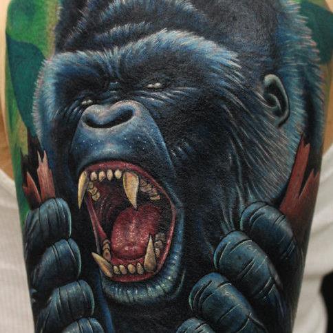 Black 3D Roaring Gorilla Face Tattoo On Half Sleeve