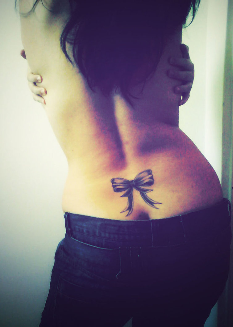 Black And Grey 3D Bow Tattoo On Girl Lower Back By Lili
