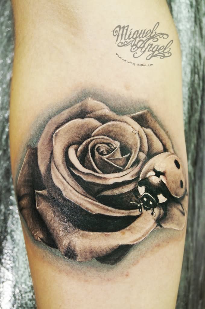 Black And Grey 3D Ladybird On Rose Tattoo On Forearm