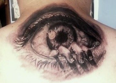 Black And Grey 3D Scary Hand In Eye Tattoo On Upper Back