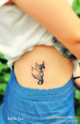 Black And Grey Cute fox Tattoo On Girl Lower Side Rib