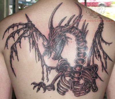 Black And Grey Dragon Skeleton Tattoo On Upper Back