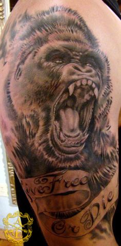 Black And Grey Gorilla Head With Banner Tattoo On Half Sleeve