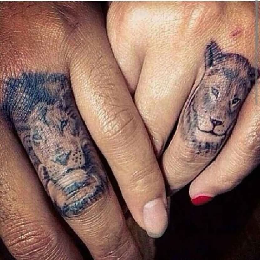 Black And Grey Lion And Lioness Ring Tattoo On Couple Ring