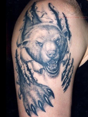 Black And Grey Ripped Skin Bear Tattoo On Shoulder
