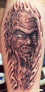 Black And Grey Scary Demon Face In Flame Tattoo Design